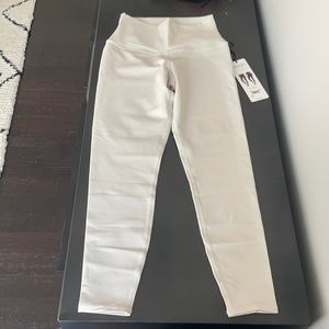 Alo Bone color. Never been worn